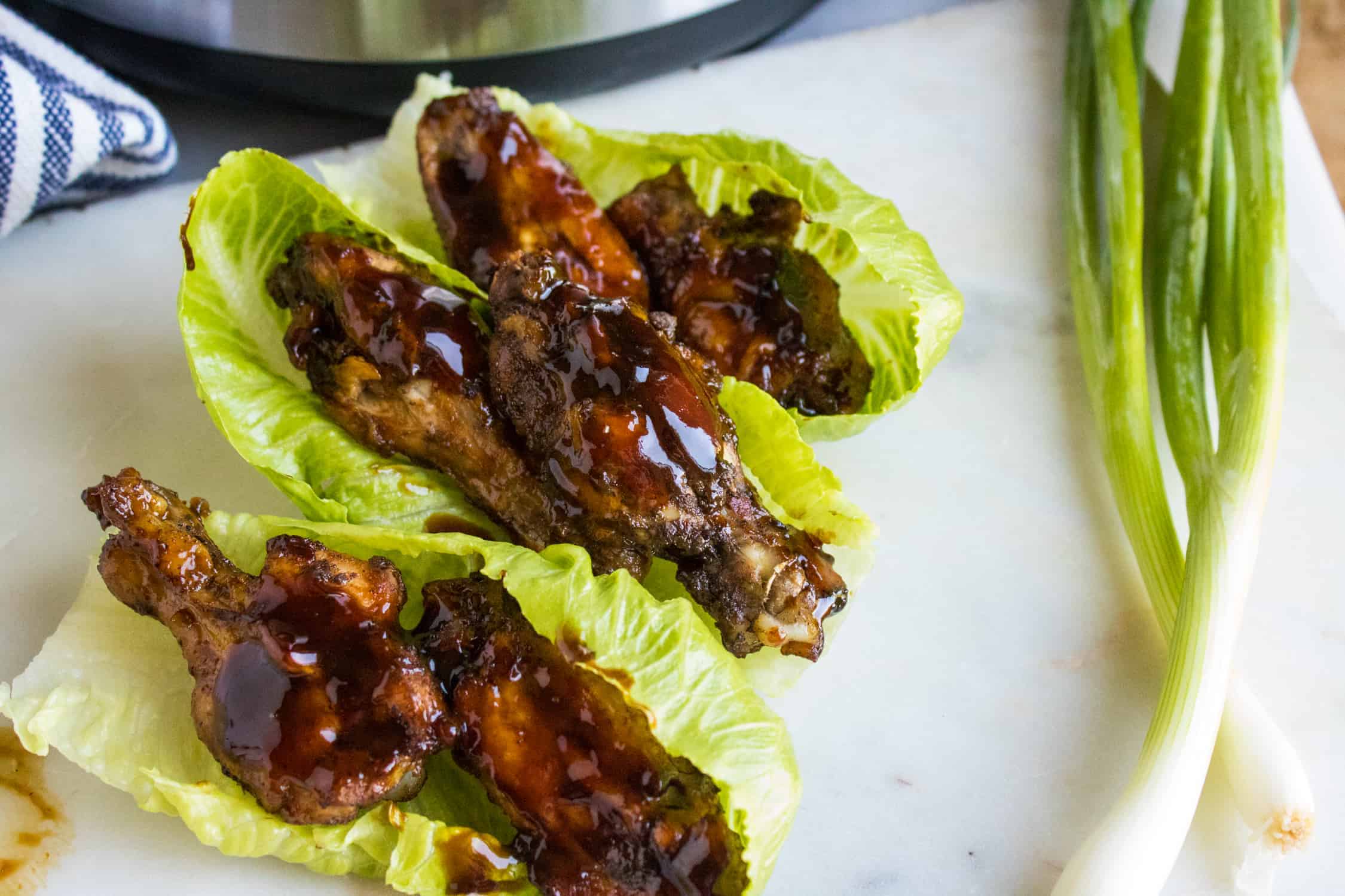 chicken wings on lettuce