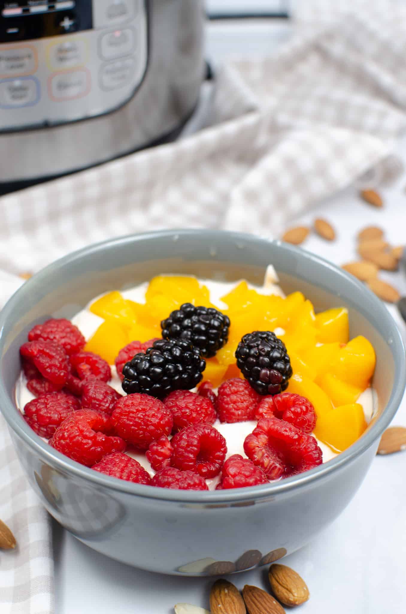 almond milk yogurt in bowl with berries