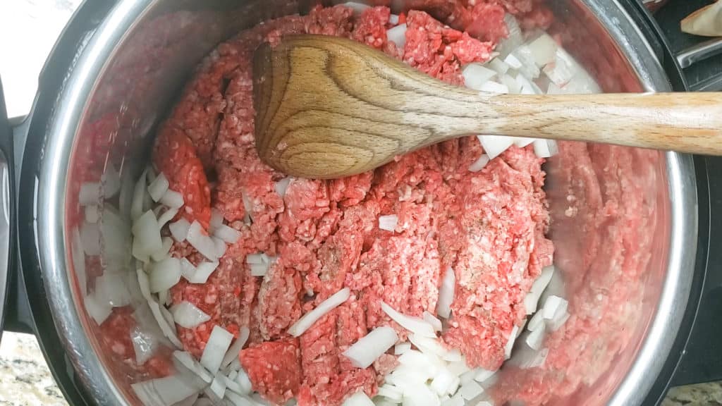 chili con carne Instant Pot recipe ground beef and onions in pot