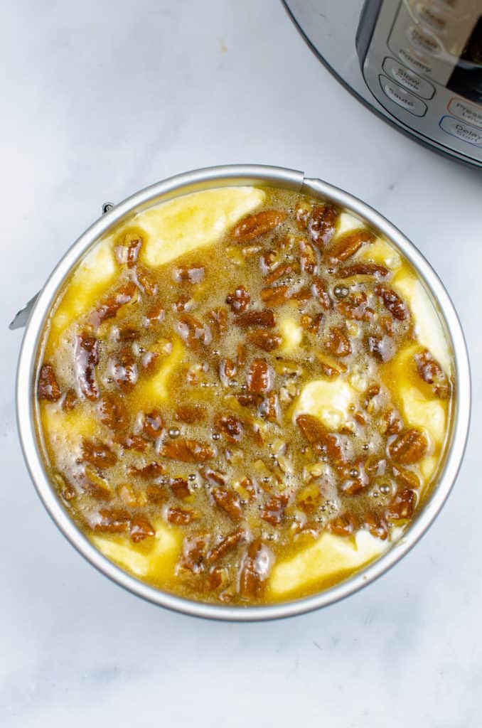 pecan pie topping on cheesecake