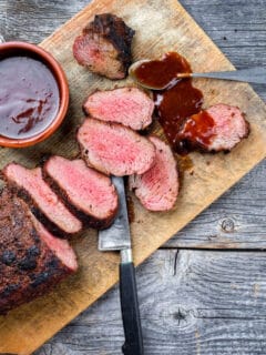 tri tip steak on cutting board